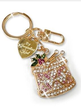 By Jacqueline Kent Gold Drummer Charm/ Keychain with Pink & Green Accents